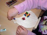 Holzhuhn bekleben