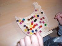 Holzhuhn bekleben