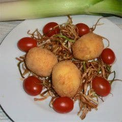 Artikelbild Panierte Eier auf frittiertem Lauch